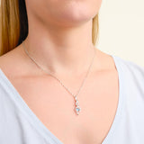 MORGAN & PAIGE Sterling Silver Created White Sapphire and Genuine Swiss Blue Topaz Pendant Necklace, 18"